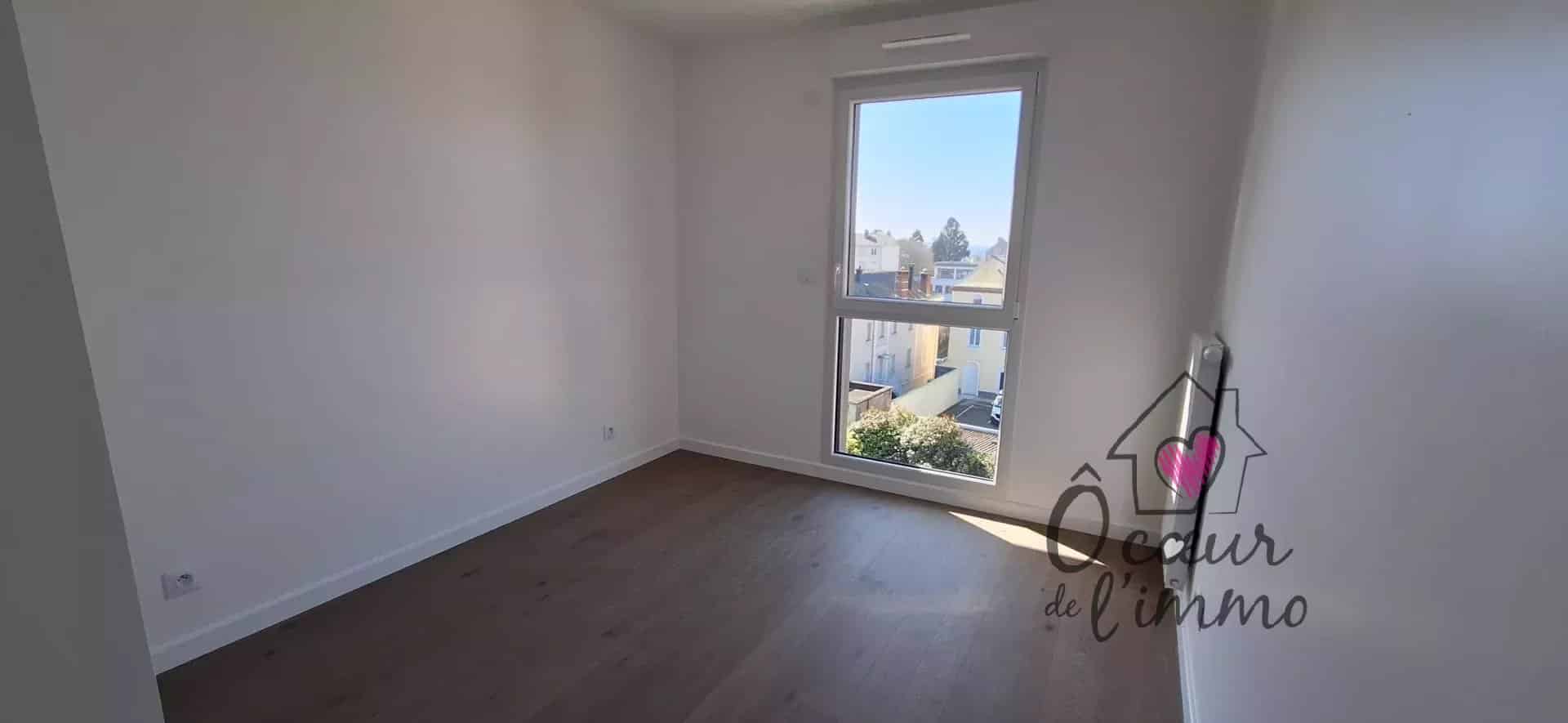 Appartement centre ville  : 2 chambres  avec stationnement + box garage.