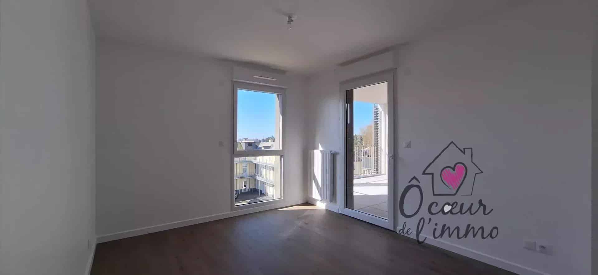 Appartement centre ville  : 2 chambres  avec stationnement + box garage.