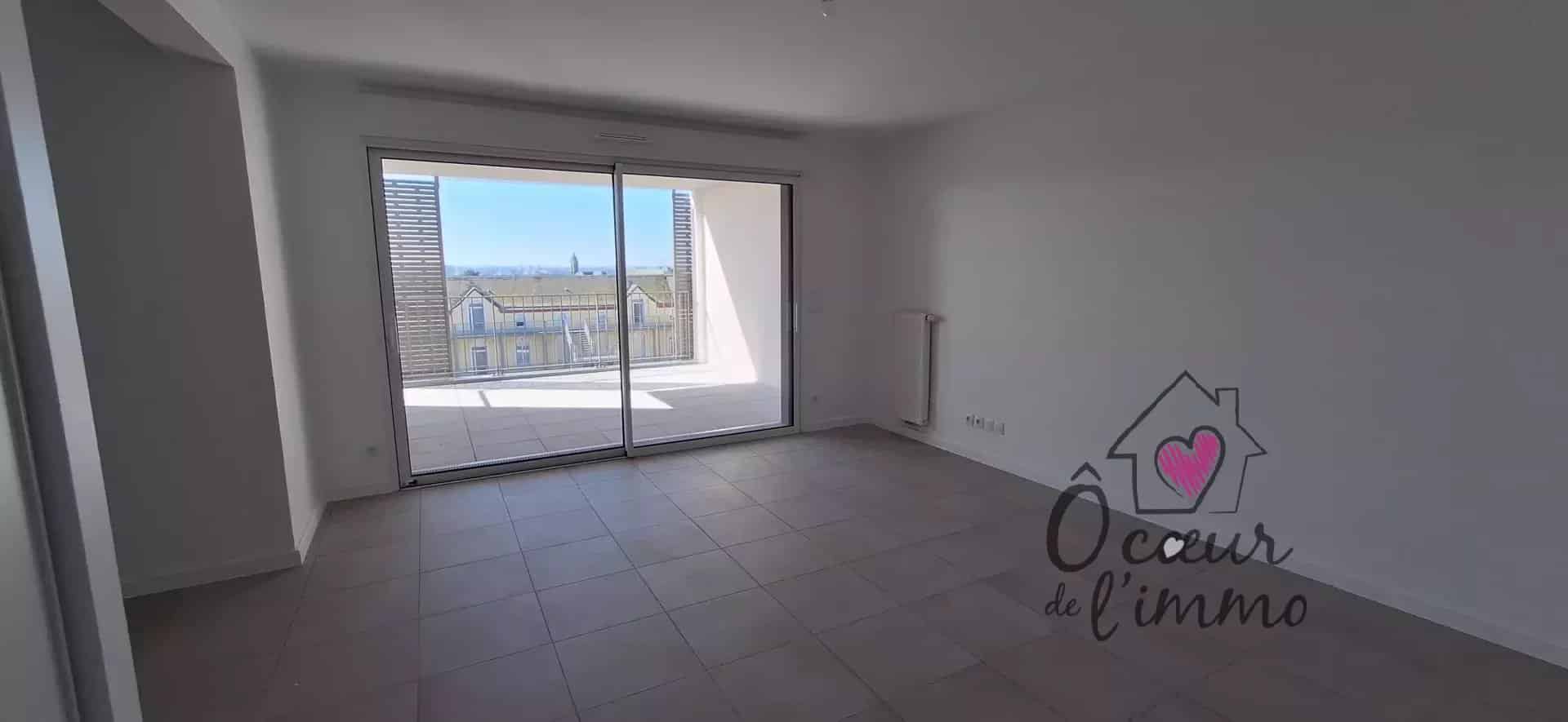 Appartement centre ville  : 2 chambres  avec stationnement + box garage.