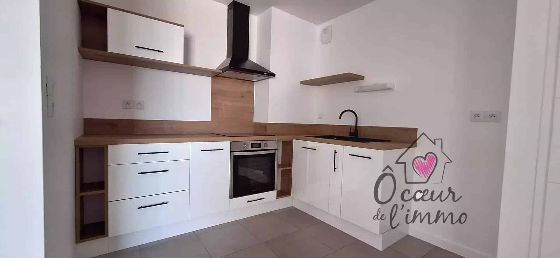 Appartement centre ville  : 2 chambres  avec stationnement + box garage.