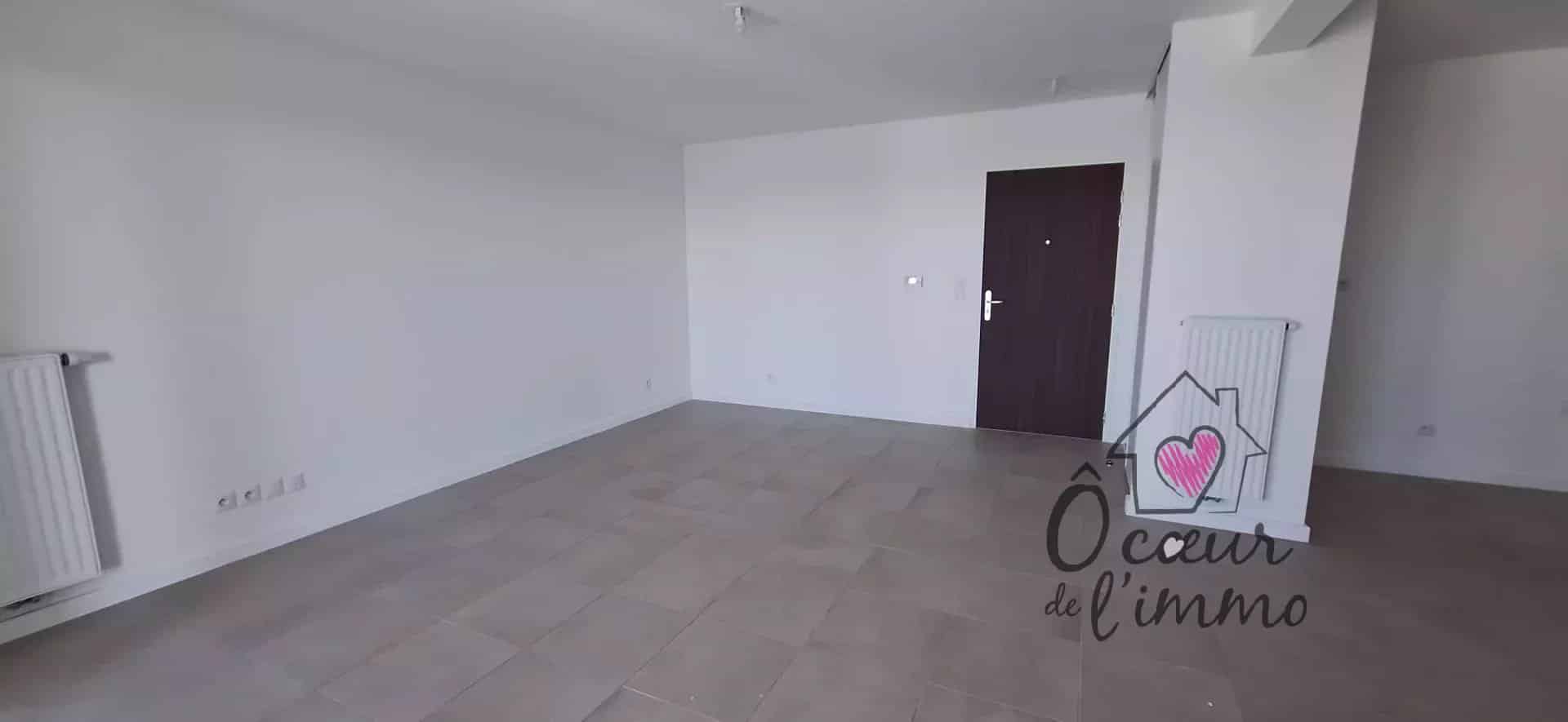 Appartement centre ville  : 2 chambres  avec stationnement + box garage.