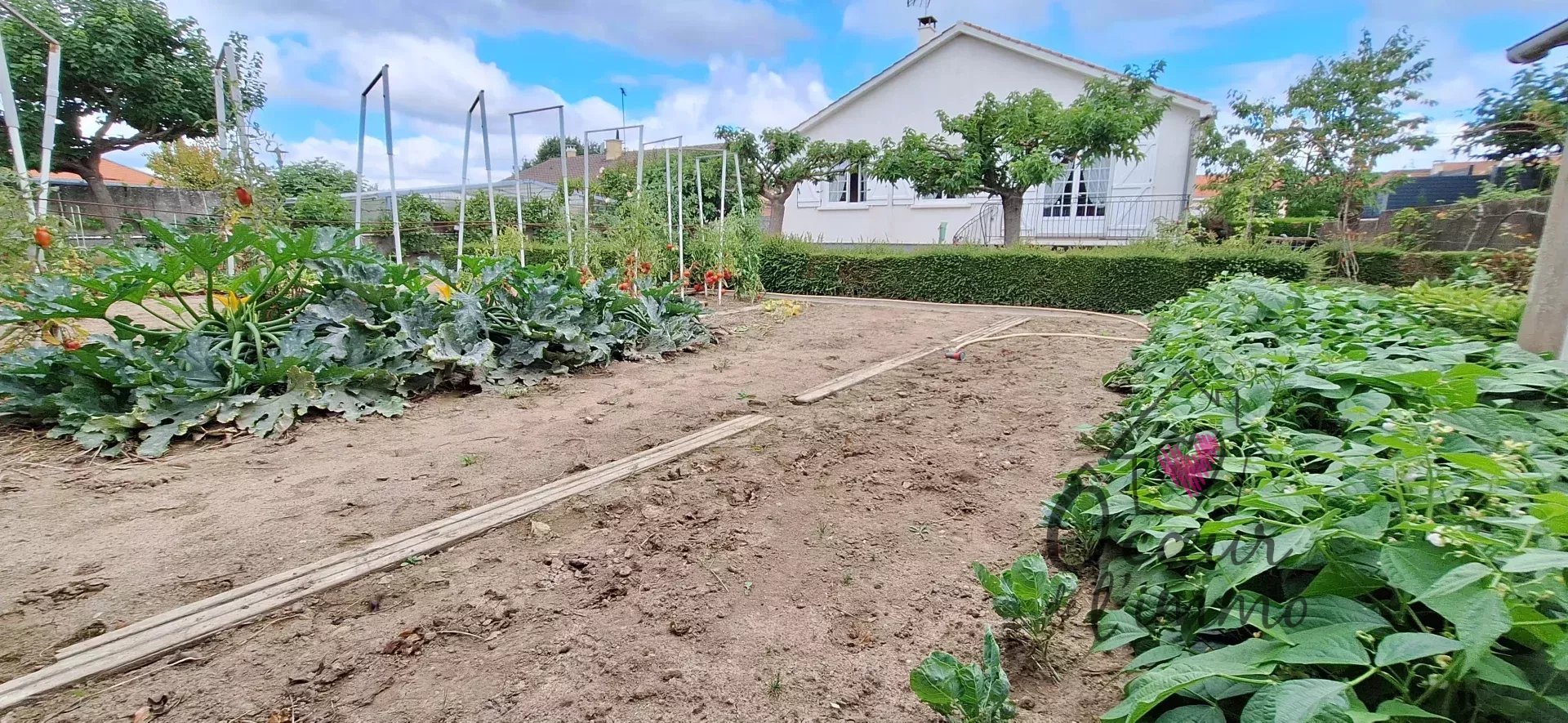 Maison 132 m2  4 chambres + garage sous sol.