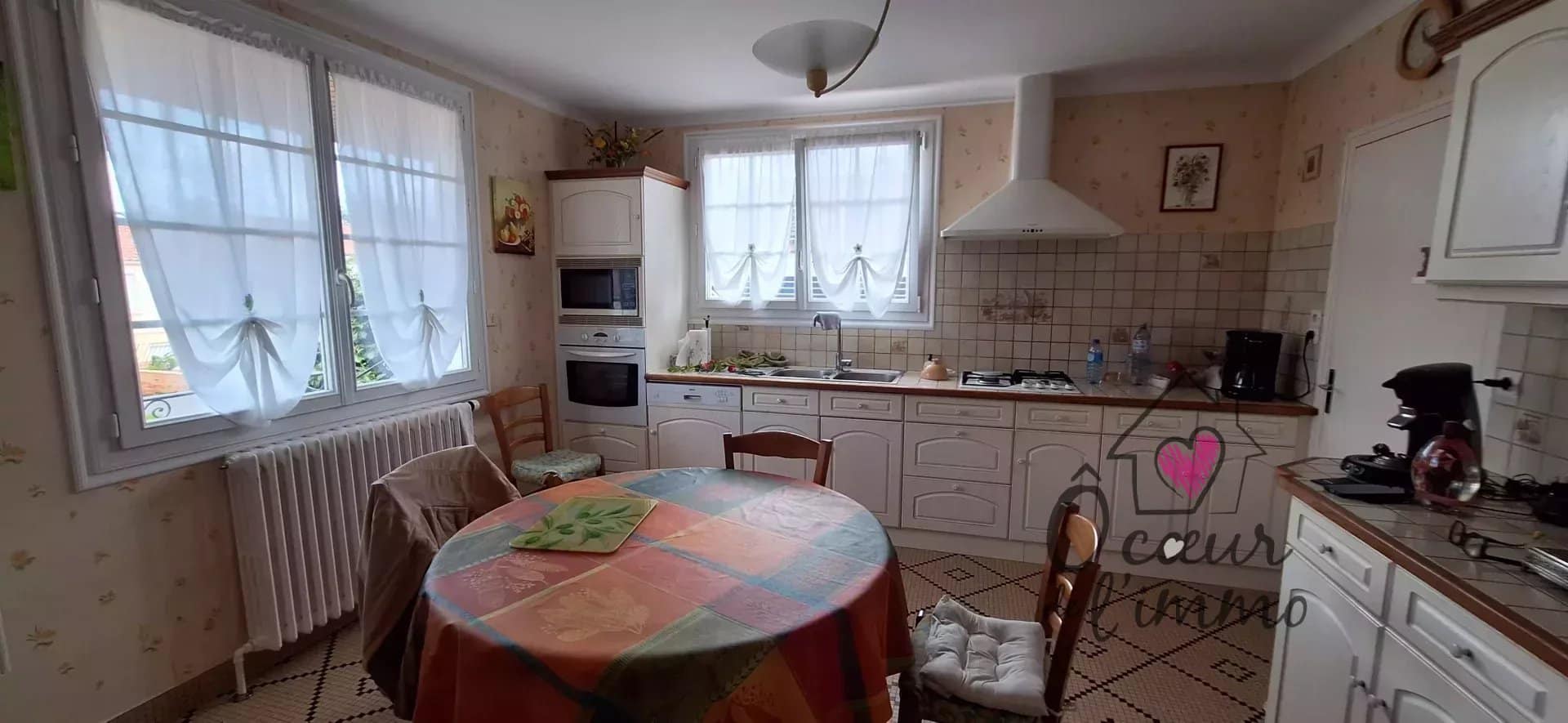 Maison 132 m2  4 chambres + garage sous sol.