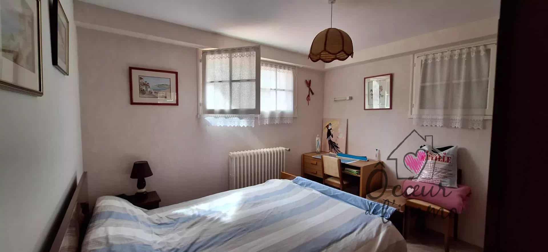 Maison 132 m2  4 chambres + garage sous sol.